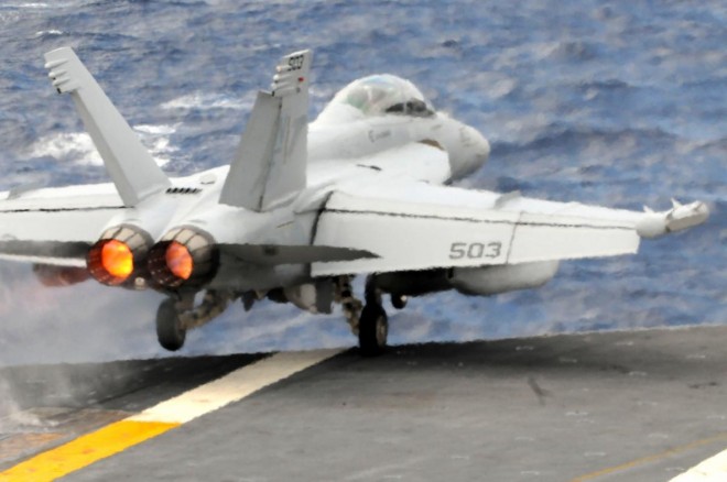 (June 3, 2012) An EA-18G Growler from the Shadowhawks of Electronic Attack Squadron (VAQ) 141 launches off the flight deck of the Navy's forward-deployed aircraft carrier USS George Washington (CVN 73). Growlers would be an essieintal component of a Syrian air intervention.U.S. Navy Photo. 