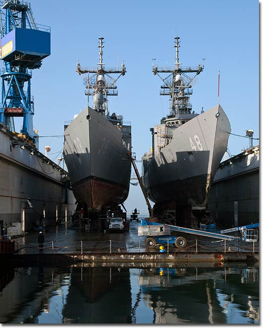 Two Oliver Hazard Perry-class (FFG-7) frigates undergo maintenance at NASSCO's San Diego shipyard. NASSCO Photo