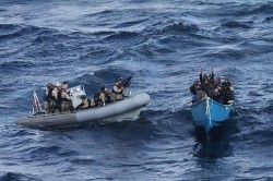 A US Navy visit, board, search and seizure (VBSS) team, approached a suspected pirate after the Motor Vessel Nordic Apollo reported being under attack and fired upon by pirates in 2011. US Navy Photo