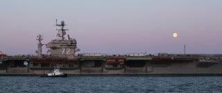 USS Abraham Lincoln (CVN-72) arrives at Newport News Shipbuilding for its 44-month refueling complex overhaul (RCOH) on March 28, 2013. HII Photo