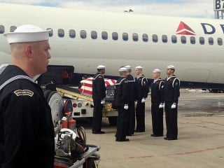 Members of the U.S. Navy Ceremonial Guard conduct a transfer of remains ceremony at Washington Dulles International Airport on March 7 for two sailors from the USS Monitor. US Navy Photo