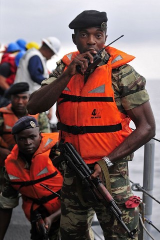 Cameroon navy Lt. j.g. Yves Itondo during Exercise Obangame Express. The exercise is an at-sea maritime exercise designed to improve cooperation among participating nations to promote maritime safety and security in the Gulf of Guinea. 