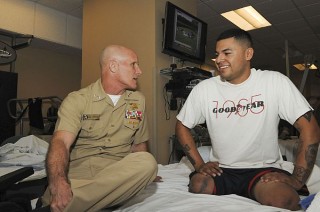 Marine Cpl. Jorge Salazar at Naval Medical Center San Diego's (NMCSD) Wounded Warrior Battalion-West detachment, speaks to Deputy Commander, U.S. Central Command, Vice Adm. Robert S. Harward in January. 
