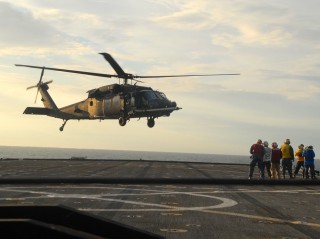 US Army MH-60 from the 160th Special Operations Aviation Regiment taking off from USS Gunston Hall (LSD-44) during a training mission in 2011. US Naval Institute Photo