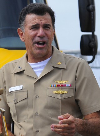 Rear Adm. Mark F. Heinrich, commander, of Fleet and Industrial Supply Centers, address members of the Naval Air Station North Island in 2011. US Navy Photo