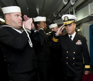 Rear Adm. Charles M. Gaouette receives honors from side boys during a change of command ceremony for Commander, Carrier Strike Group (CSG) 3 on April 5, 2012. US Navy Photo