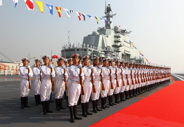 A naval honor guard at the in 2012 on board the Liaoning. Xinhua News Agency Photo