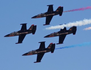 The Patriots Jet Team fly Aero L-39 Albatros jets during a 2009 show at Nellis Air Force Base, Nev. Teams like The Patriots are in demand following cancellations by Pentagon jet teams. 