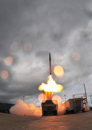 A launch of the US Army's Terminal High Altitude Area Defense (THAAD) system. THADD and two dozen other weapons designs have been stolen by China according to a classified Pentagon report. Missile Defense Agency Photo