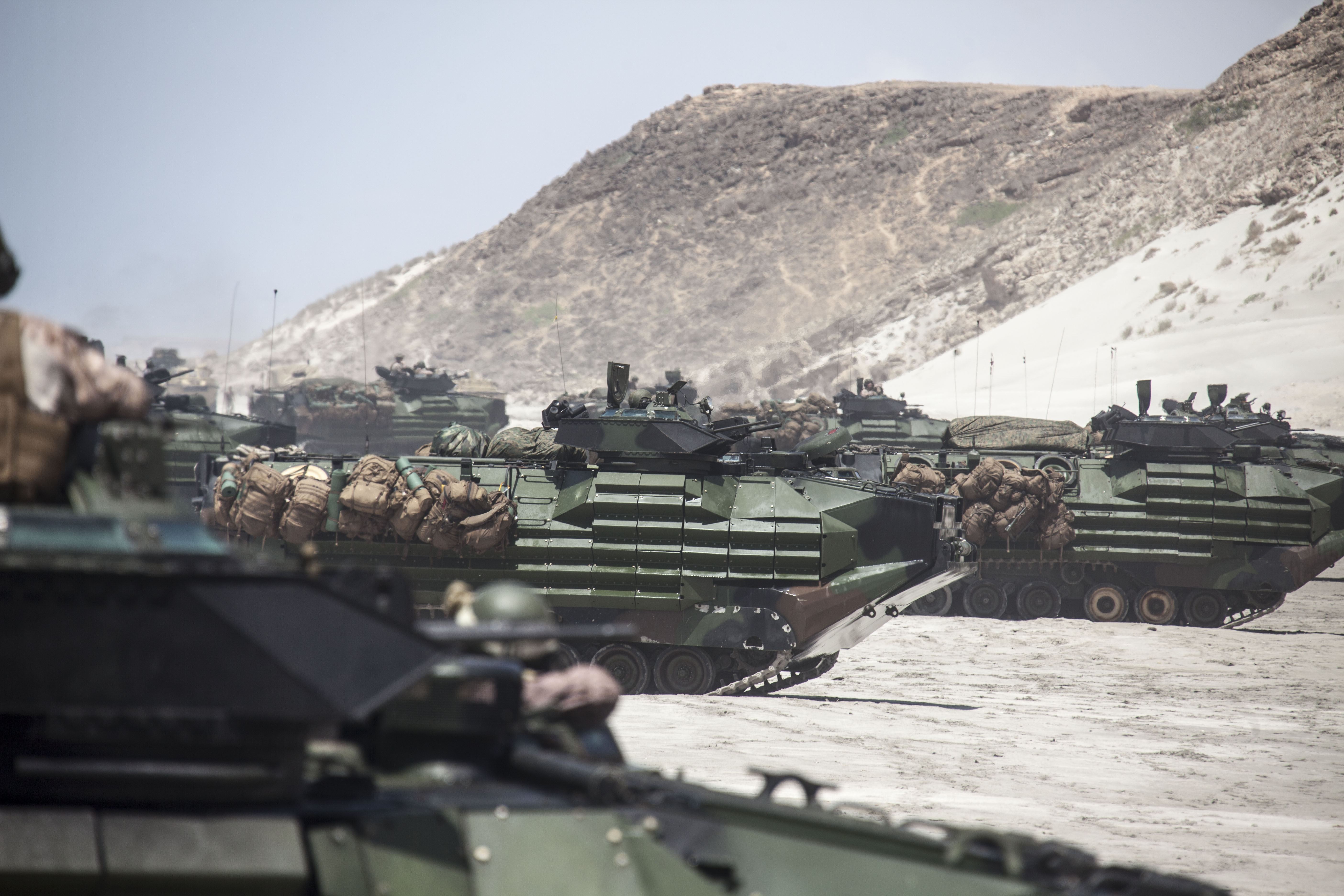 US Marines from 26th Marine Expeditionary Unit (MEU) drive their AAVs on April 20, 2013. US Marine Corps Photo.