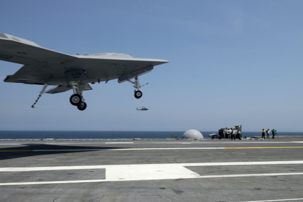 X-47B Unmanned Combat Air System (UCAS-D) demonstrator completes an arrested landing on the flight deck of the aircraft carrier USS George H.W. Bush (CVN-77). US Navy Photo