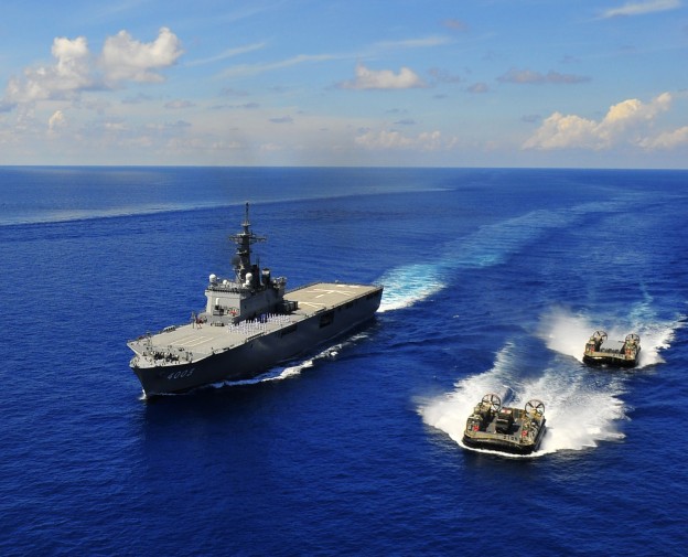 Osumi-class amphibious assault ship JDS Kunisaki (LST 4003), center, and two landing craft air cushions assigned to Kunisaki in 2010. US Navy Photo