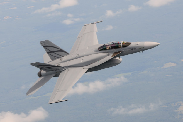 First flight of the F/A-18E/F Advanced Super Hornet with conformal fuel tanks and Enclosed Weapons Pod. Boeing Photo