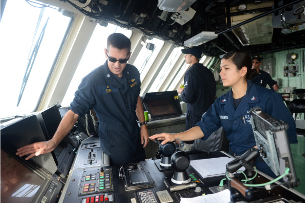  Cmdr. Pat Thien, left, Commanding Officer of the littoral combat ship USS Freedom (LCS-1) on Aug. 13, 2013. 