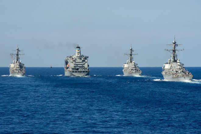 Arleigh Burke-class guided-missile destroyers USS Ramage (DDG-61), USS Barry (DDG-52) and USS Stout (DDG-55) conduct a replenishment-at-sea with the Military Sealift Command oiler USNS Leroy Grumman (T-AO-195) on Sept. 27. US Navy Photo
