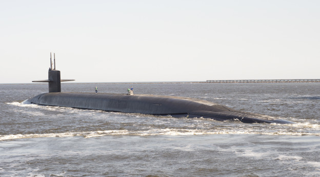 USS Tennessee (SSBN 734) pulls away from its escort boats in transit to its dive point in 2013. US Navy Photo
