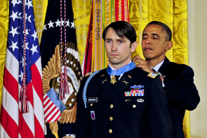 President Barack Obama presents the Medal of Honor to Capt. William D. Swenson on Oct. 15, 2013. US Army Photo. 
