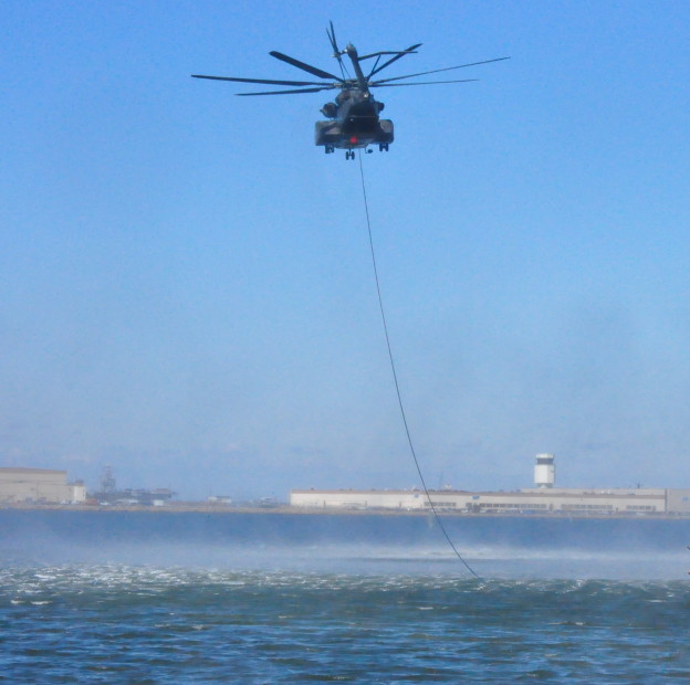 MH-53E Sea Dragon helicopter assigned to Helicopter Mine Countermeasures Squadron (HM) 14 conducts practice MK-105 mine countermeasure operations in the Chesapeake Bay in 2011. US Navy Photo