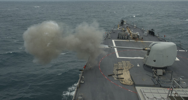 USS Donald Cook (DDG 75) fires its five-inch gun during a weapons exercise on Jan. 16, 2014. US Navy Photo 
