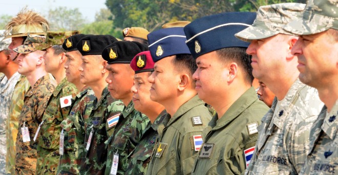  Members from various participating nations of Exercise Cobra Gold 2014 stand in formation during the opening ceremony at Camp Akatosarot, Mueang district, Phitsanulok province, Kingdom of Thailand. US Marine Corps Photo