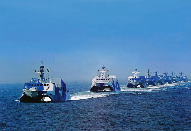 Several People Liberation Army Navy's Houbei missile boats. 