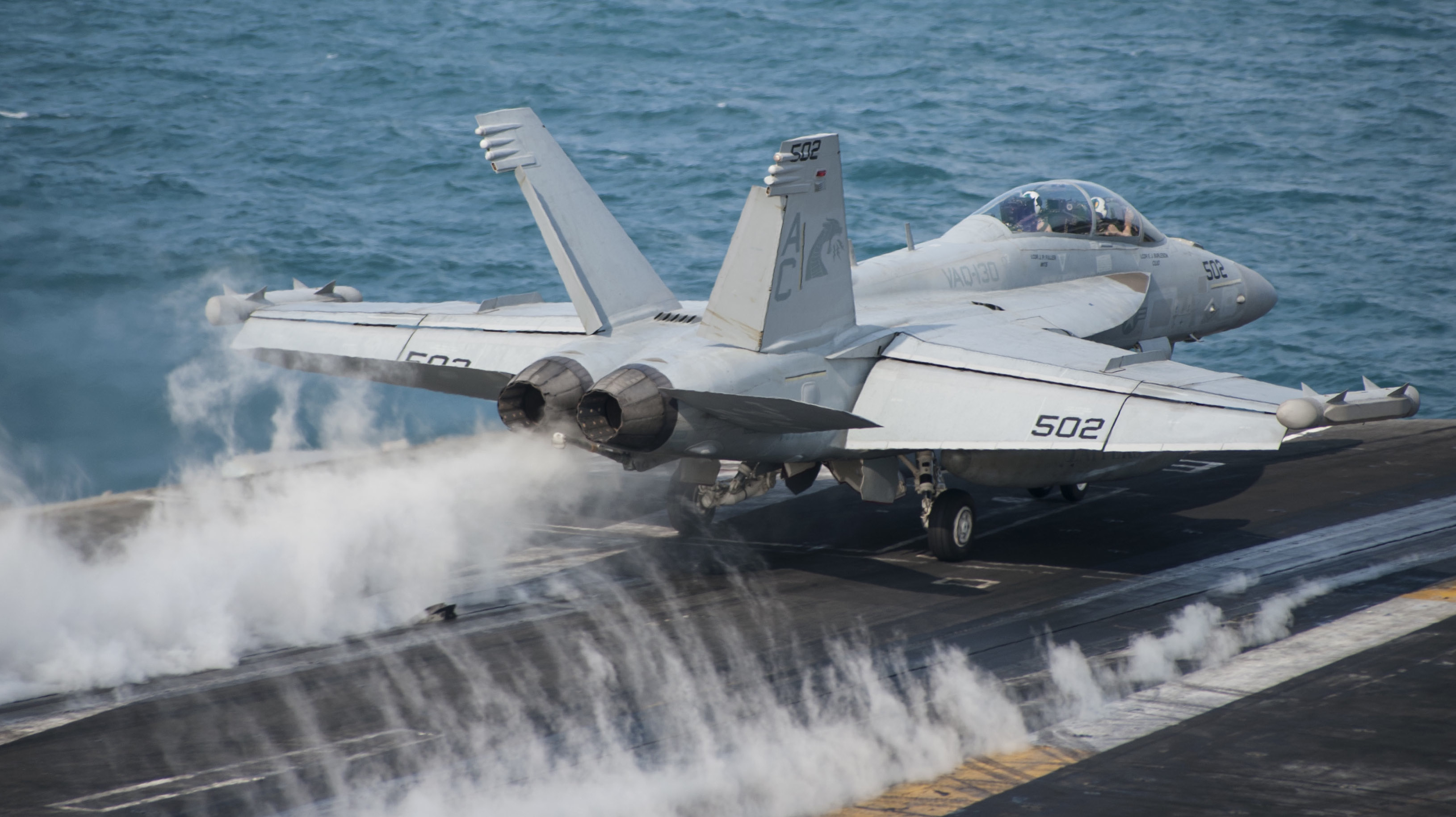 An EA-18G Growler, assigned to the “Zappers” of Electronic Attack Squadron 130, launches from the flight deck of the aircraft carrier USS Harry S. Truman (CVN-75) on Jan 13, 2014. US Navy Photo