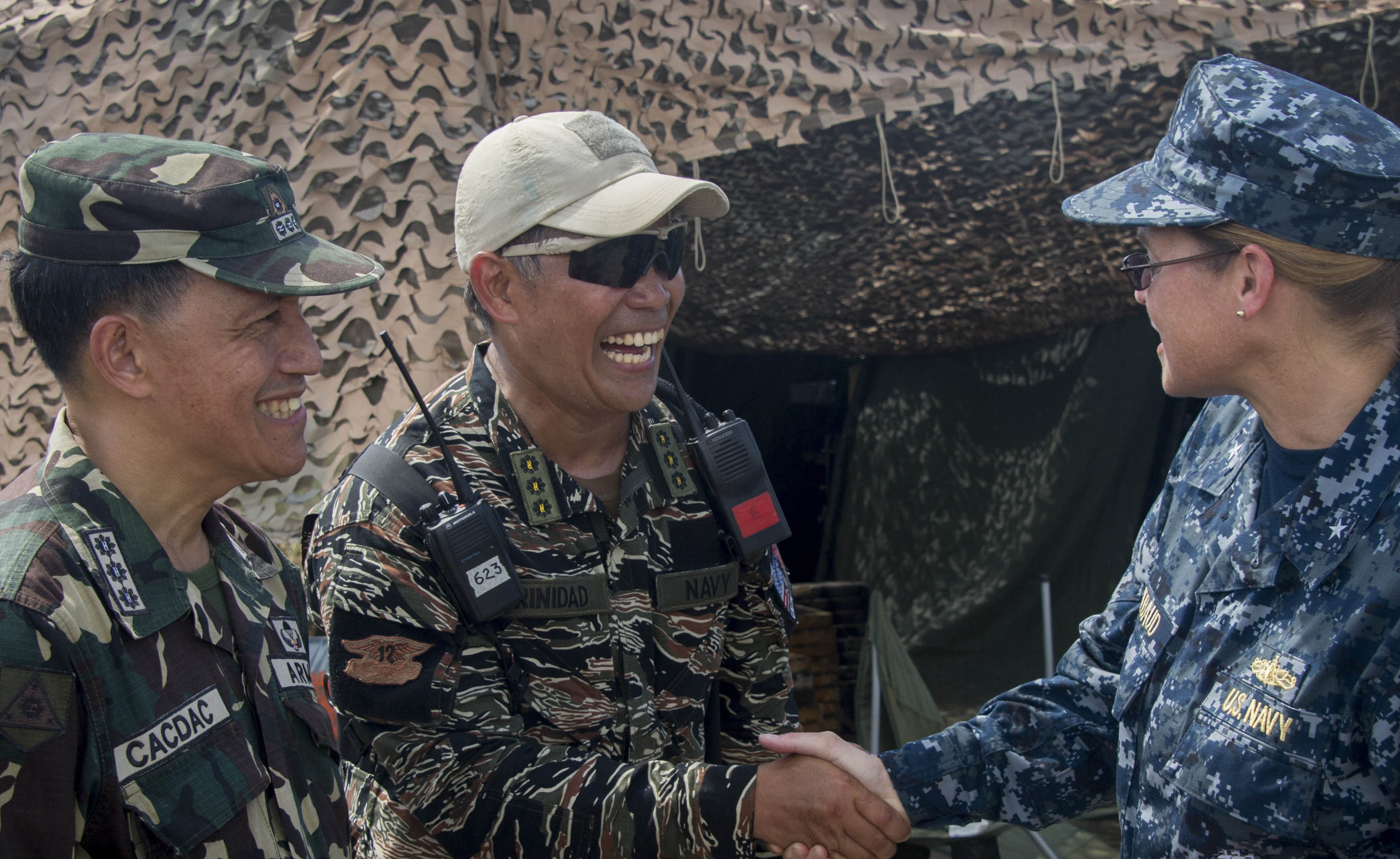 U.S. Navy and Philippine military officials during the humanitarian aid and disaster relief operation in Tacloban in 2013. US Navy Photo