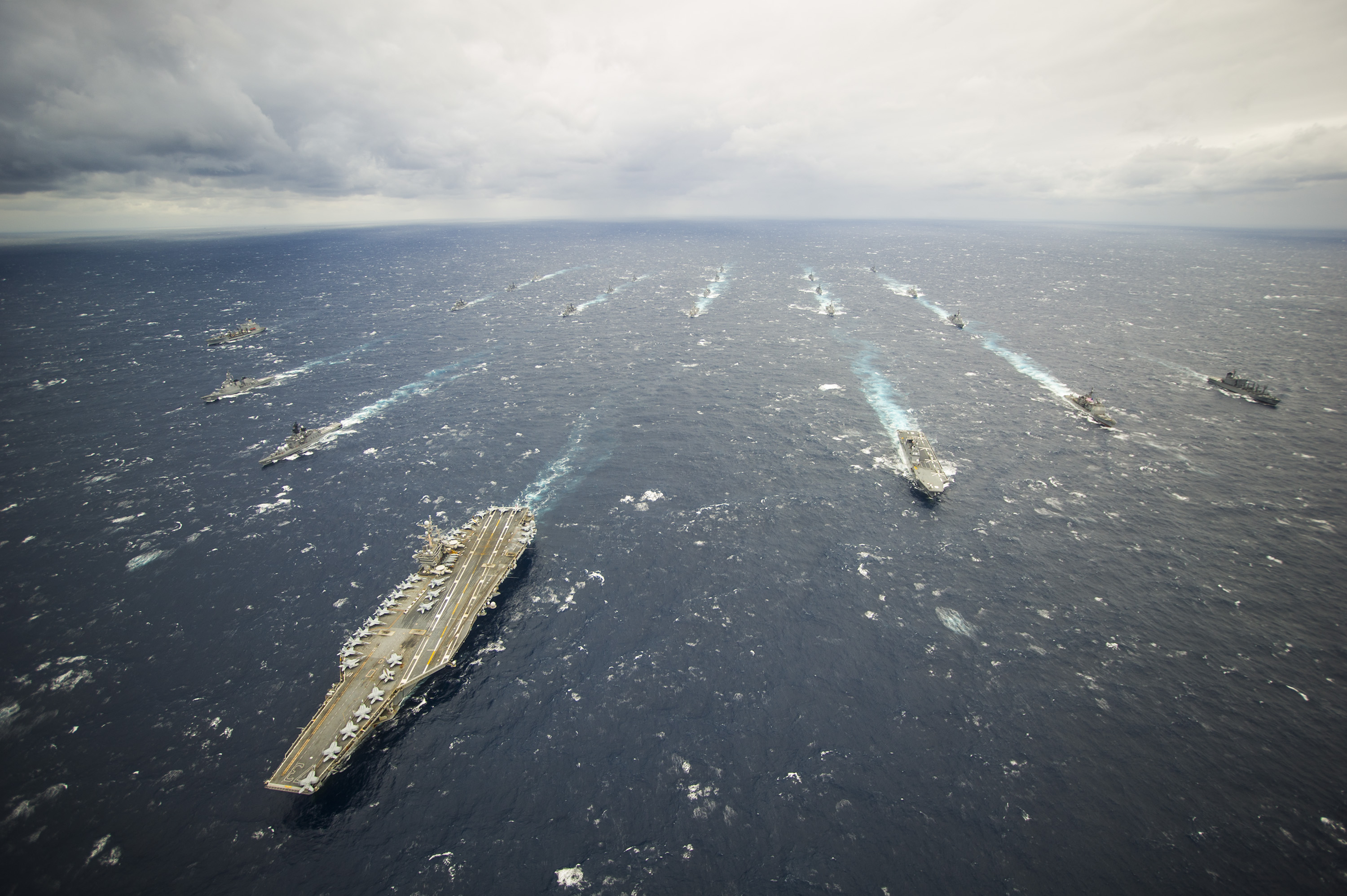 USS George Washington (CVN-73) and its strike group in 2013. The House voted to refuel the carrier rather than decommission the ship. US Navy Photo