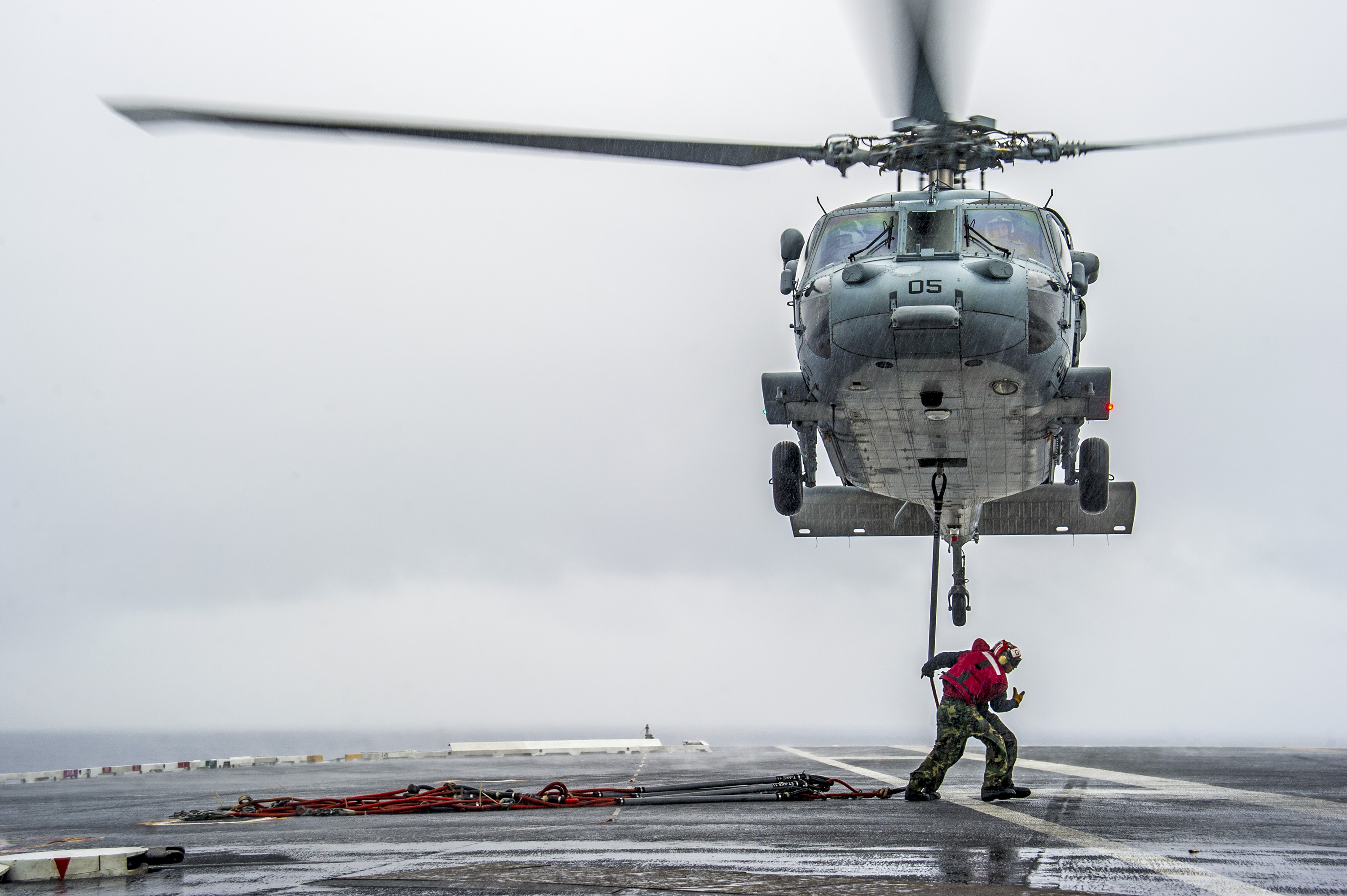 MH-60S helicopter from the Island Knights of Helicopter Sea Combat Squadron (HSC) 25 on May 30, 2014. US Navy Photo