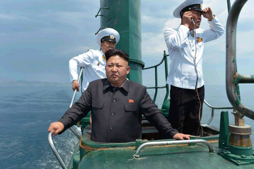 Kim Jong Un in the conning tower of what appears to be a Project 633 diesel submarine. KCNA Photo