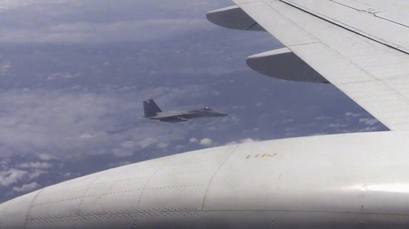 A Japanese F-15J allegedly buzzing a Chinese Tu-154 on Wednesday. 