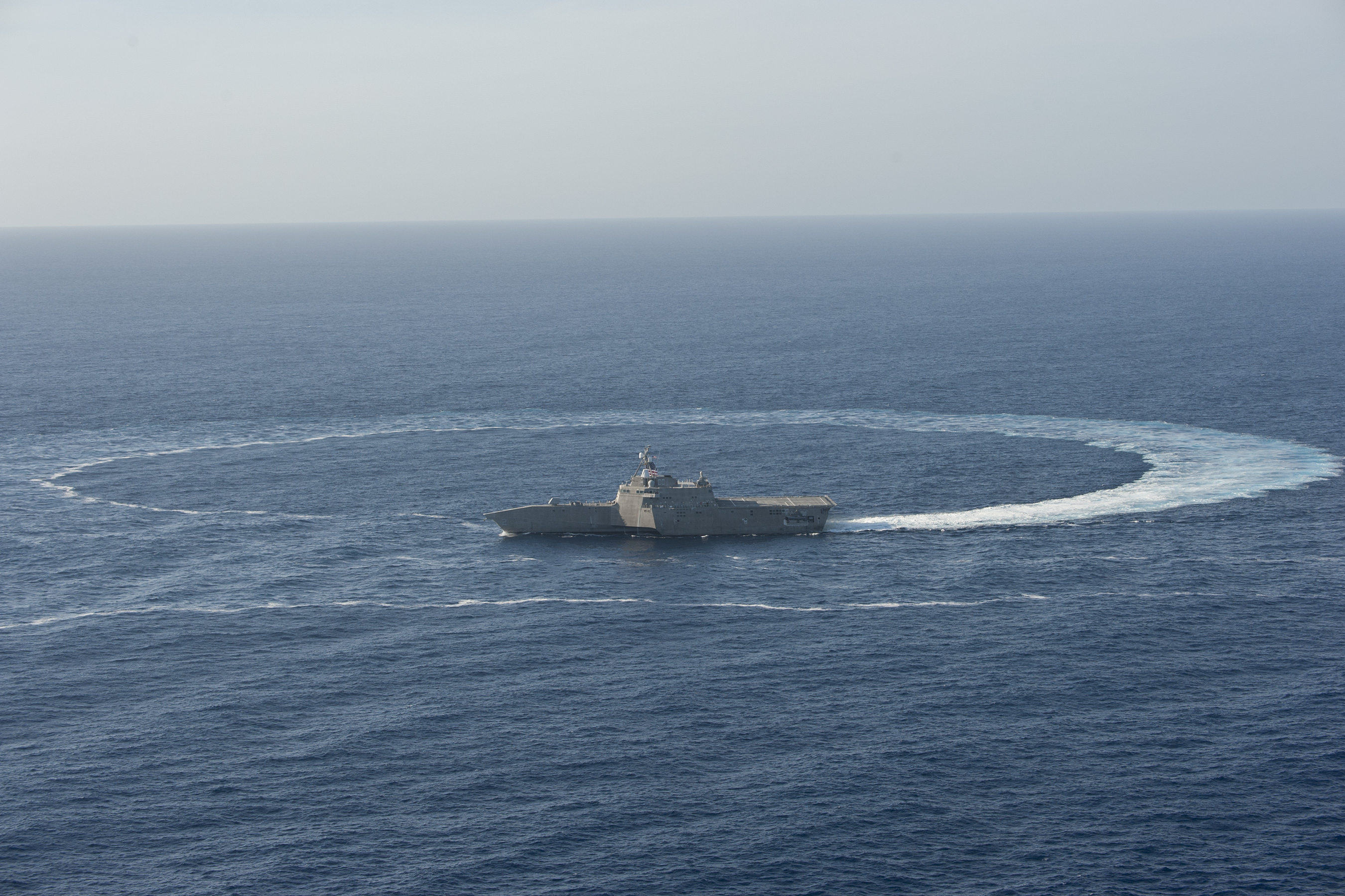 USS Independence (LCS 2) shows its maneuverability while underway in the Pacific Ocean on April 23, 2014. US Navy Photo