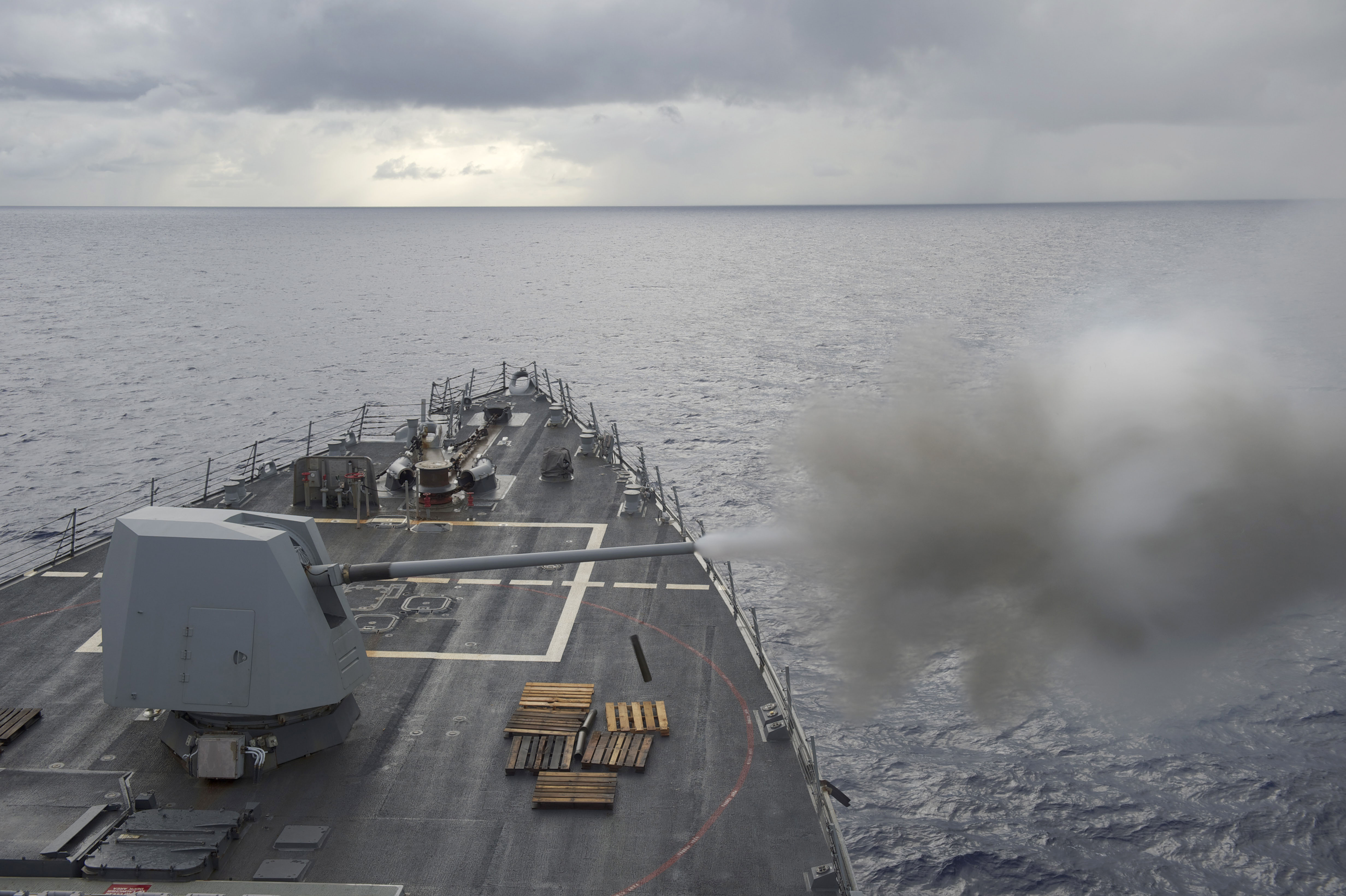 USS Nitze (DDG 94) fires its MK-45 5-inch/54-caliber lightweight gun on May 12, 2014. US Navy Photo
