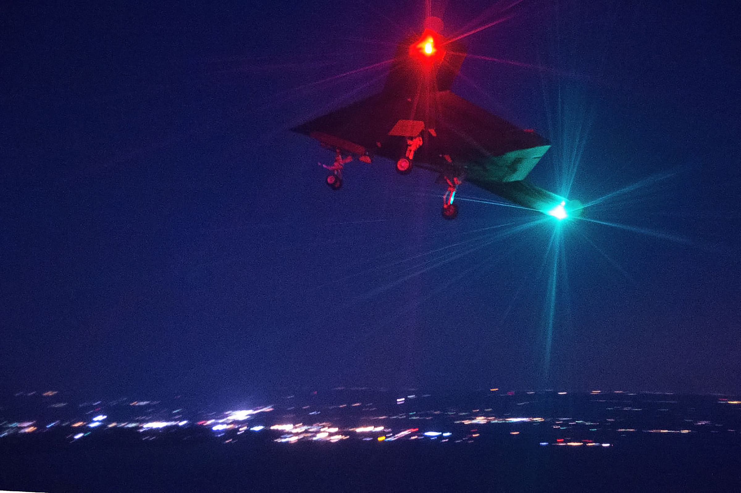 X-47B conducts its first night flight April 10 over Naval Air Station Patuxent River, Md. on April, 10 2014. US Navy Photo