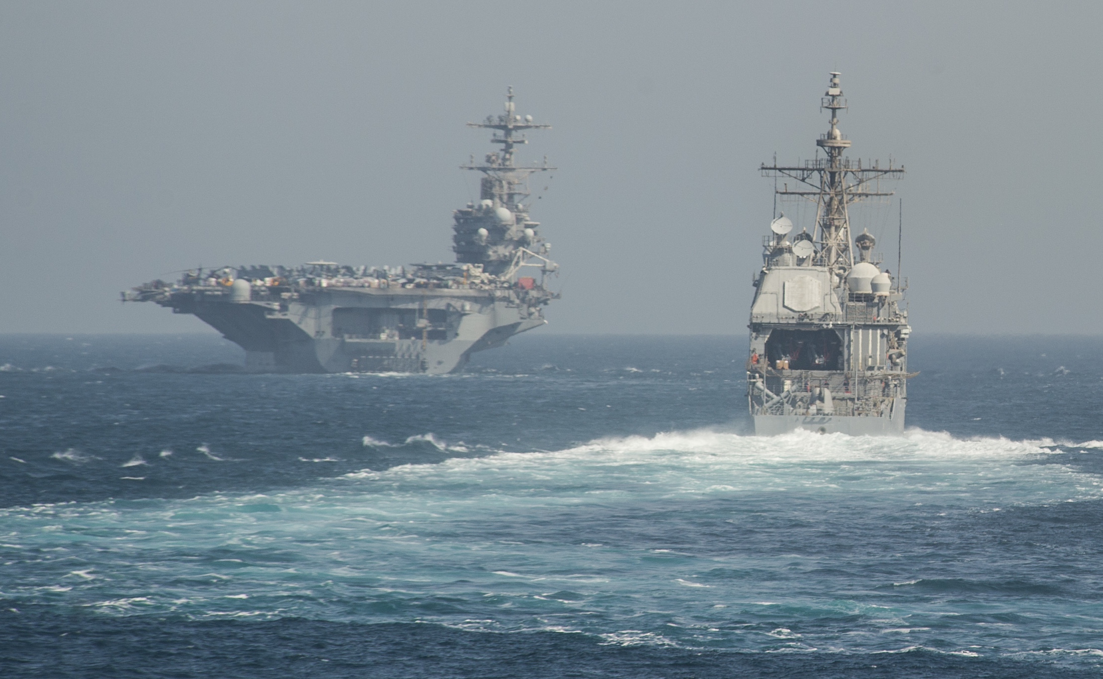 Ticonderoga-class guided-missile cruiser USS Philippine Sea (CG-58) and USS George Washington (CVN-77) on July 2, 2014. US Navy Photo