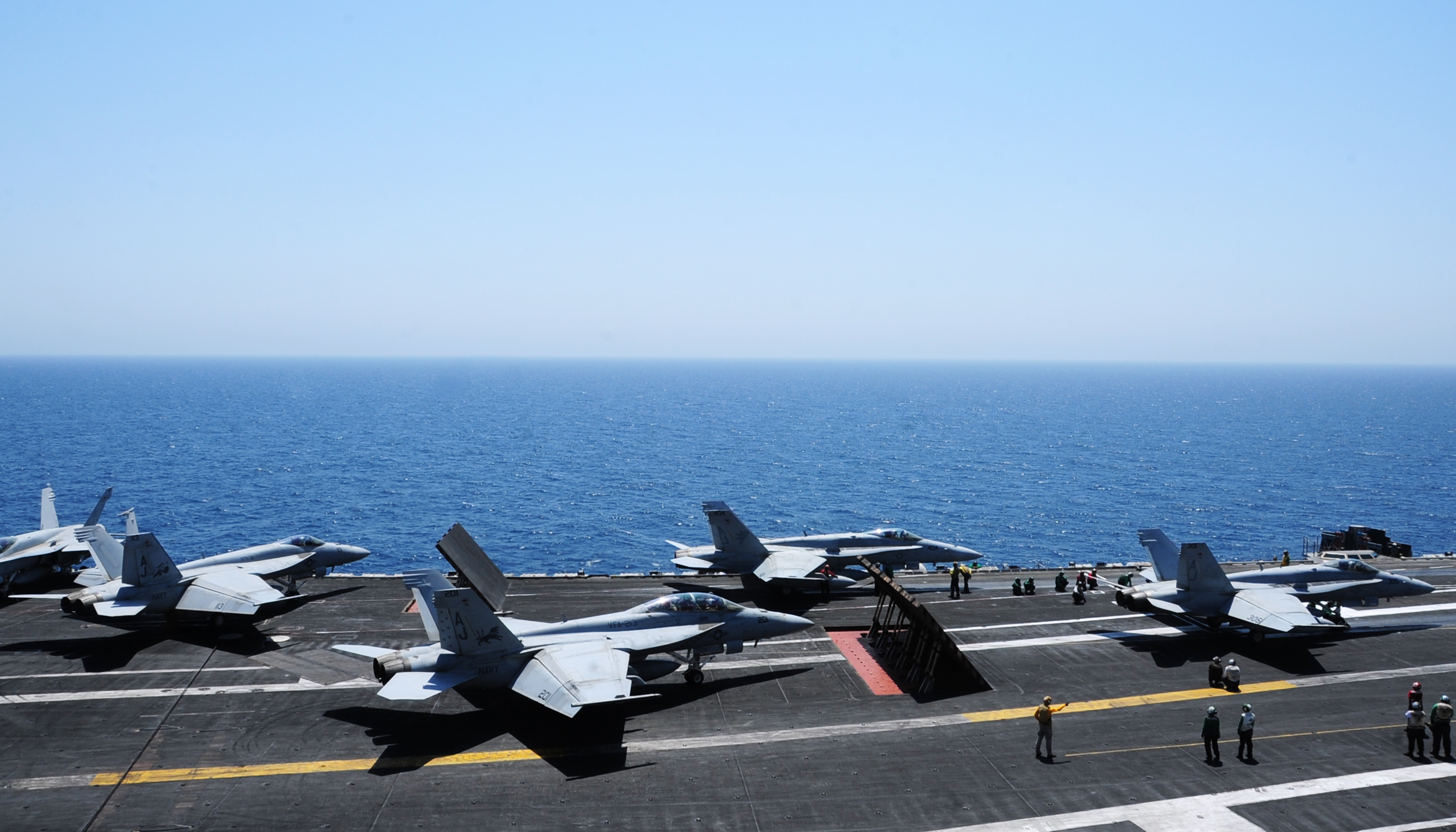 Sailors launch aircraft from the flight deck of the aircraft carrier USS George H.W. Bush (CVN 77) on Aug. 7, 2014. US Navy Photo