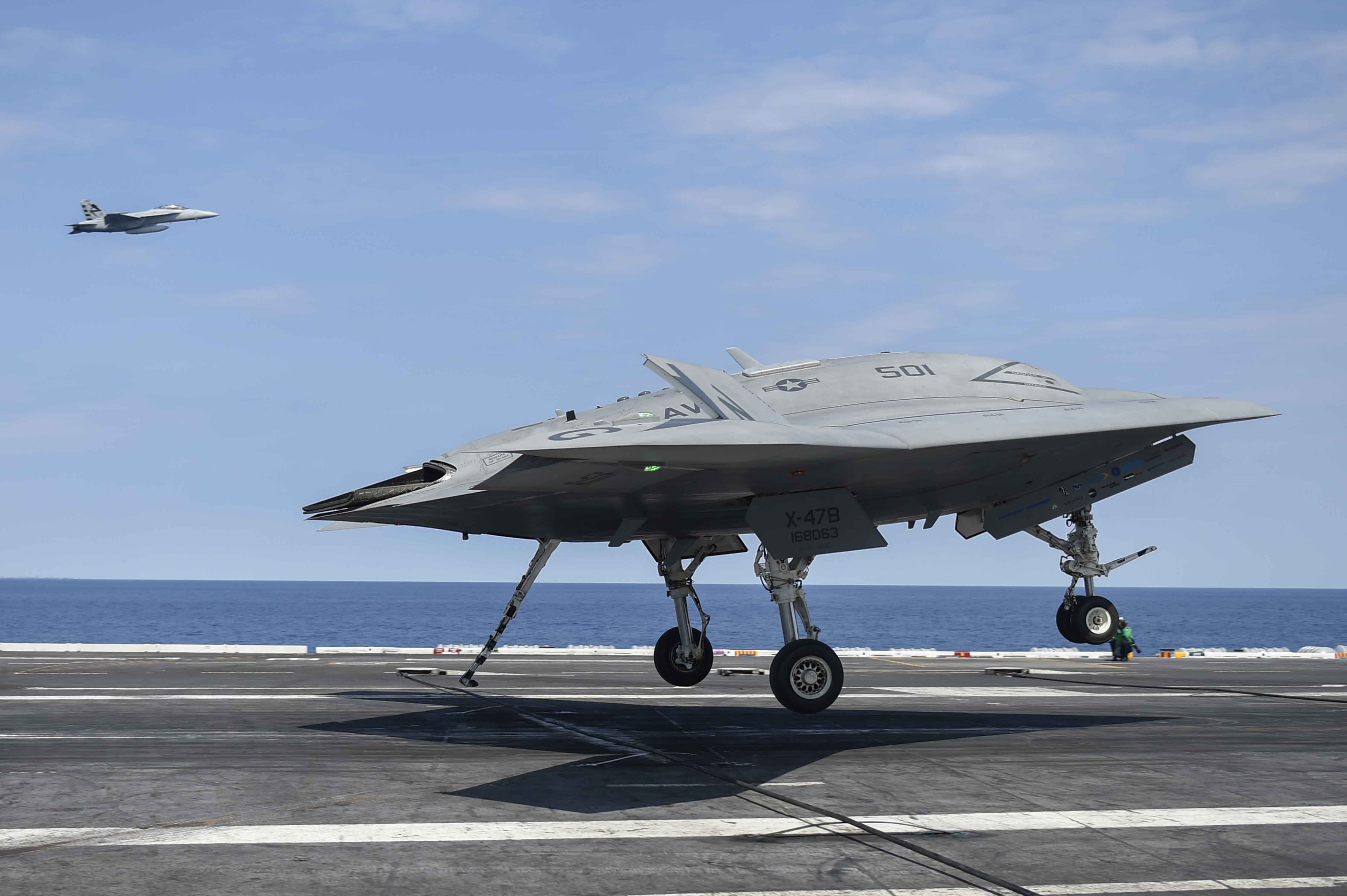 The Navy's unmanned X-47B lands aboard the aircraft carrier USS Theodore Roosevelt (CVN-71) on Aug. 17, 2014. US Navy Photo