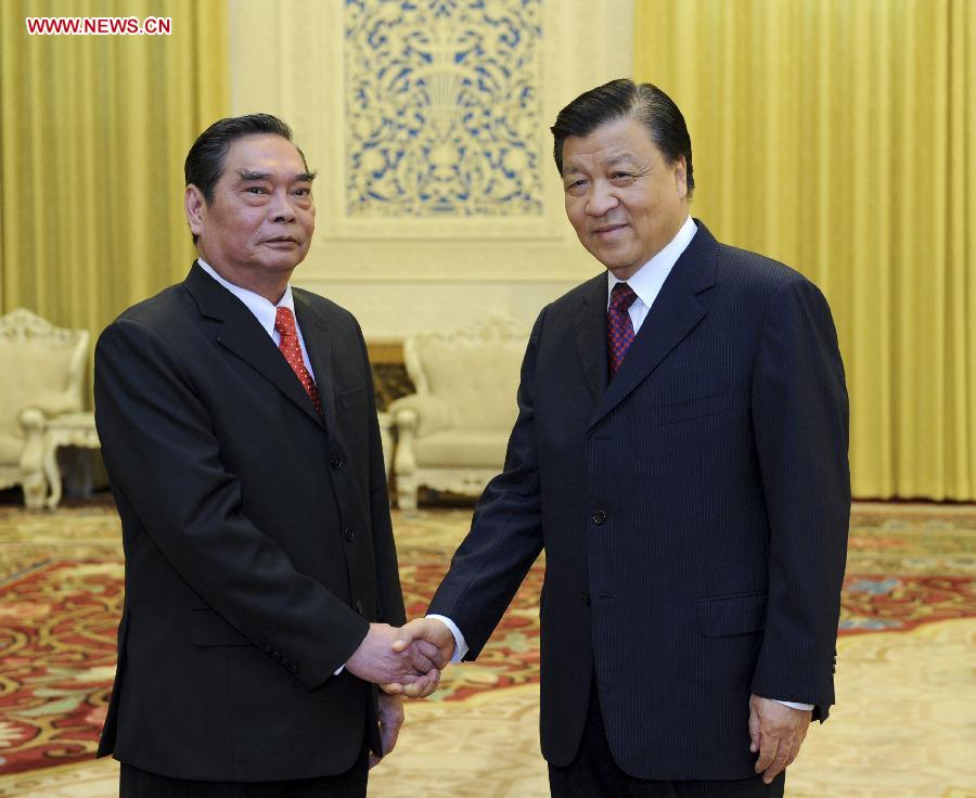 Liu Yunshan (R), a member of the Standing Committee of the Political Bureau of the Communist Party of China (CPC) Central Committee and secretary of the Secretariat of the CPC Central Committee, holds talks with Le Hong Anh, special envoy of General Secretary of the Communist Party of Vietnam(CPV) Central Committee Nguyen Phu Trong, also a Politburo member and standing secretary of the Secretariat of the CPV Central Committee, in Beijing, capital of China, Aug. 27, 2014. Xinhua Photo
