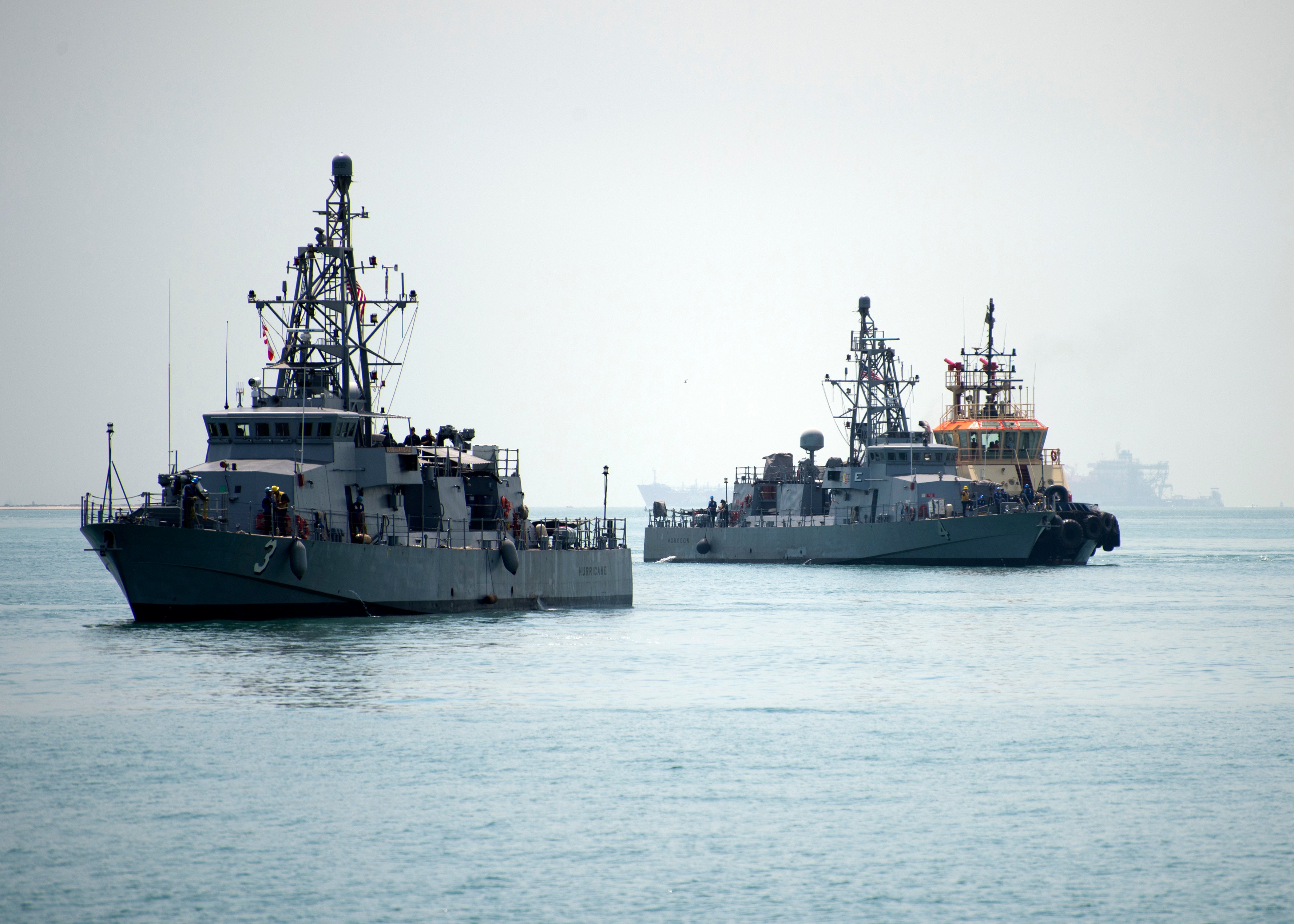 USS Hurricane (PC 3) and USS Monsoon (PC 4) arrive to their new homeport at Naval Support Activity, Bahrain on Aug. 13, 2014. US Navy Photo