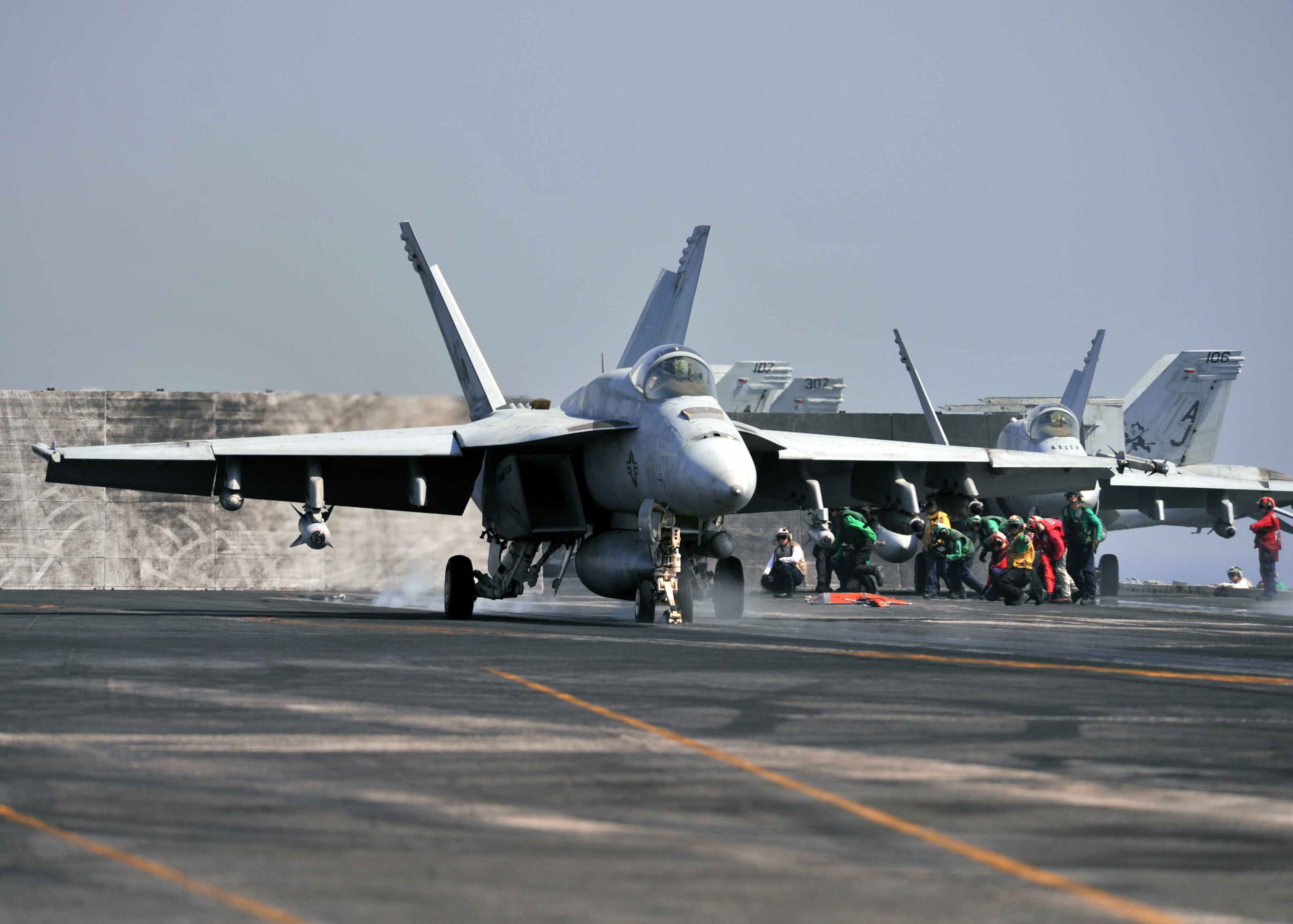 F/A-18E Super Hornet, attached to the Tomcatters of Strike Fighter Squadron (VFA) 31, launches from the flight deck of the aircraft carrier USS George H.W. Bush (CVN-77) on July 31, 2014. US Navy Photo