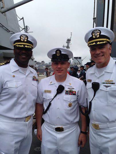 May 31, 2014 photo of Cmdr. Curtis B. Calloway, Command Master Chief Travis Biswell and Cmdr. Ed Handley from the ship's ombudsman Facebook page. 