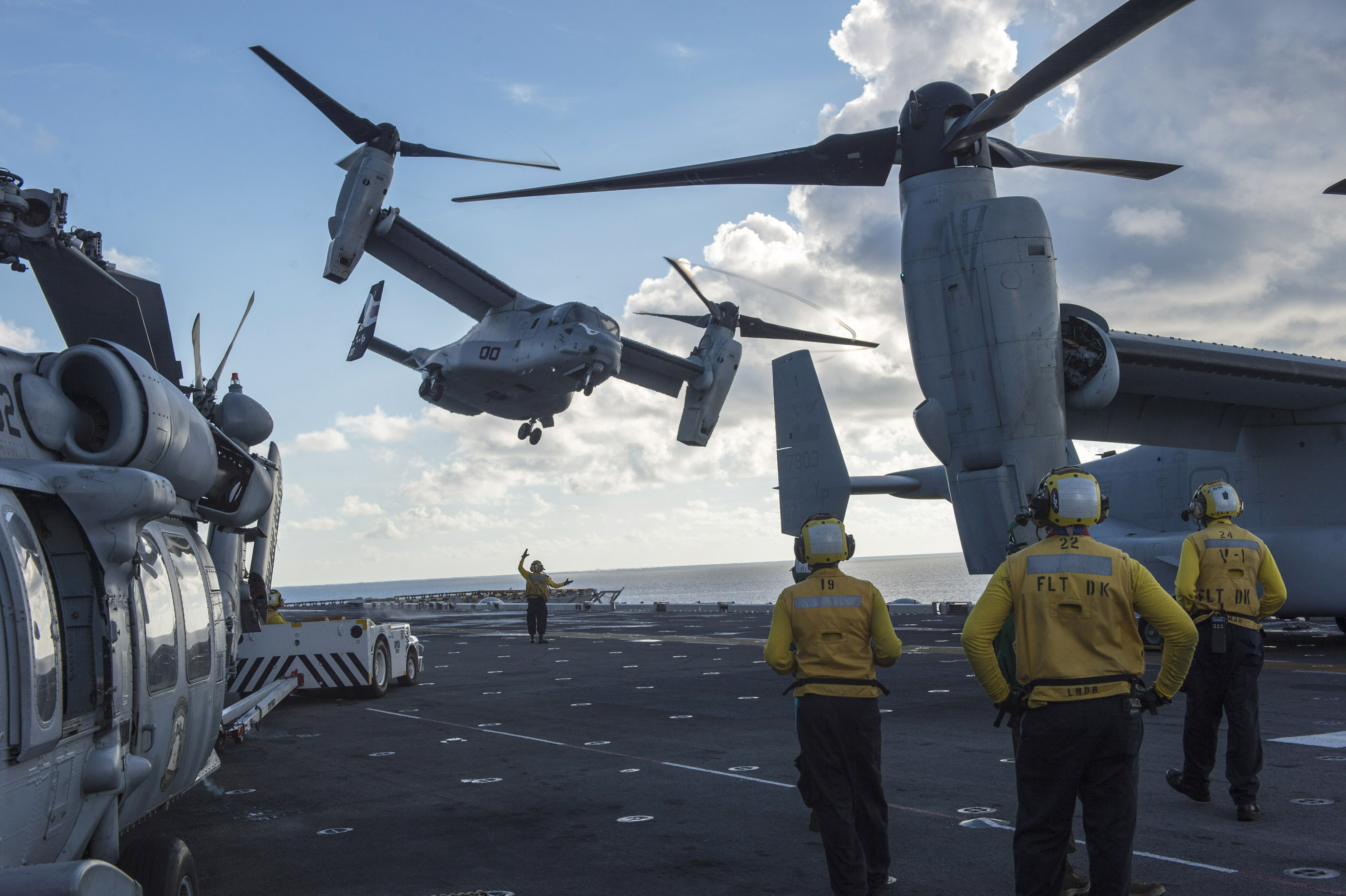 MV-22 Osprey assigned to Marine Medium Tiltrotor Squadron (VMM) 163 launches from USS Makin Island (LHD-8) on Aug. 24, 2014. US Navy Photo