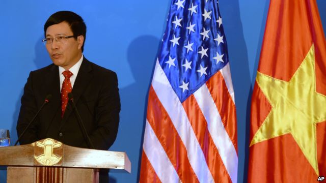 Vietnamese Foreign Minister Pham Binh Minh speaks during a joint press conference with U.S. Secretary of State John Kerry in Hanoi, Dec. 16, 2013. Voice of America Photo