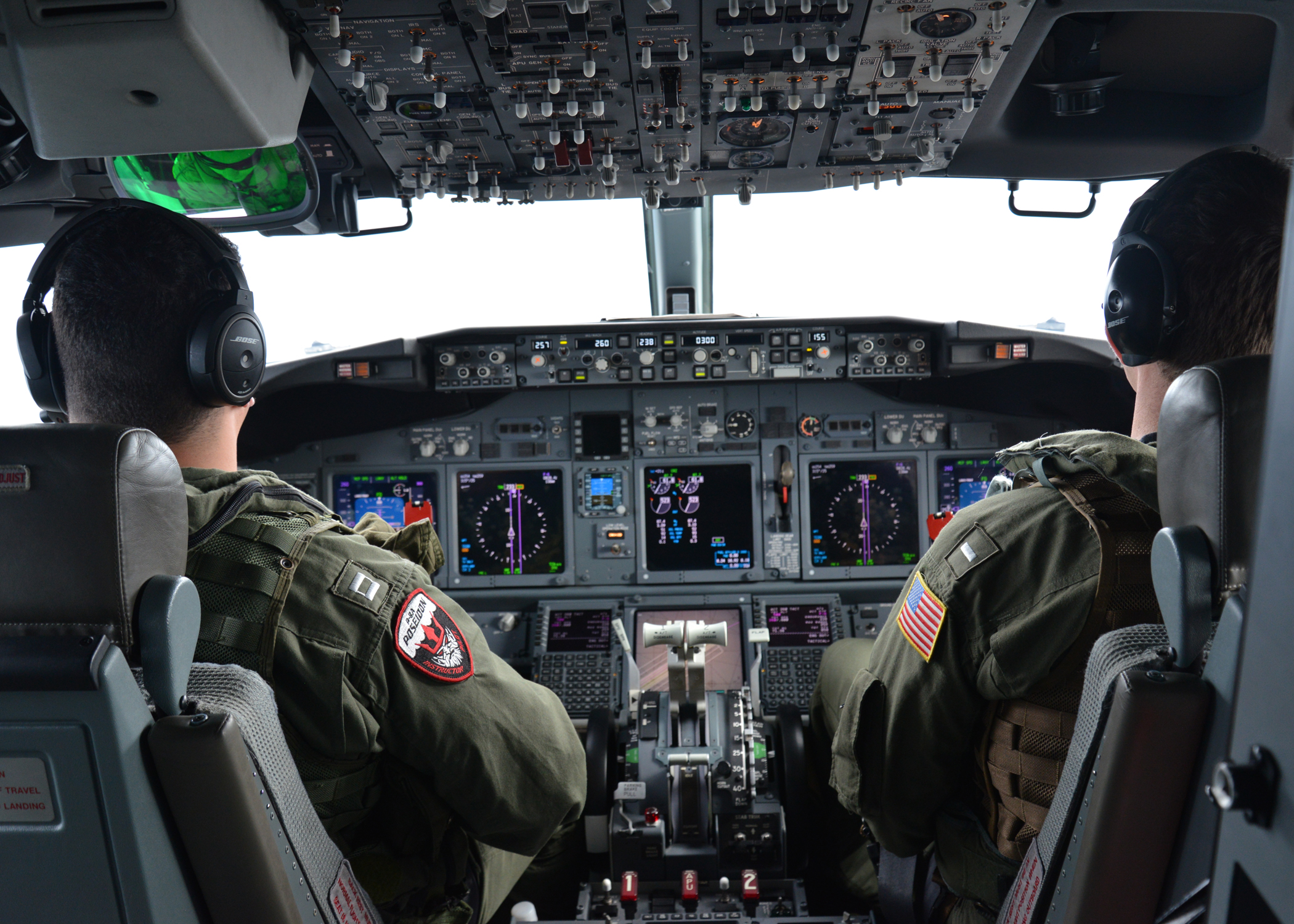 Naval aviators pilot a P-8A Poseidon, an aircraft based on a commercial airliner design, on March 24, 2014. US Navy Photo 