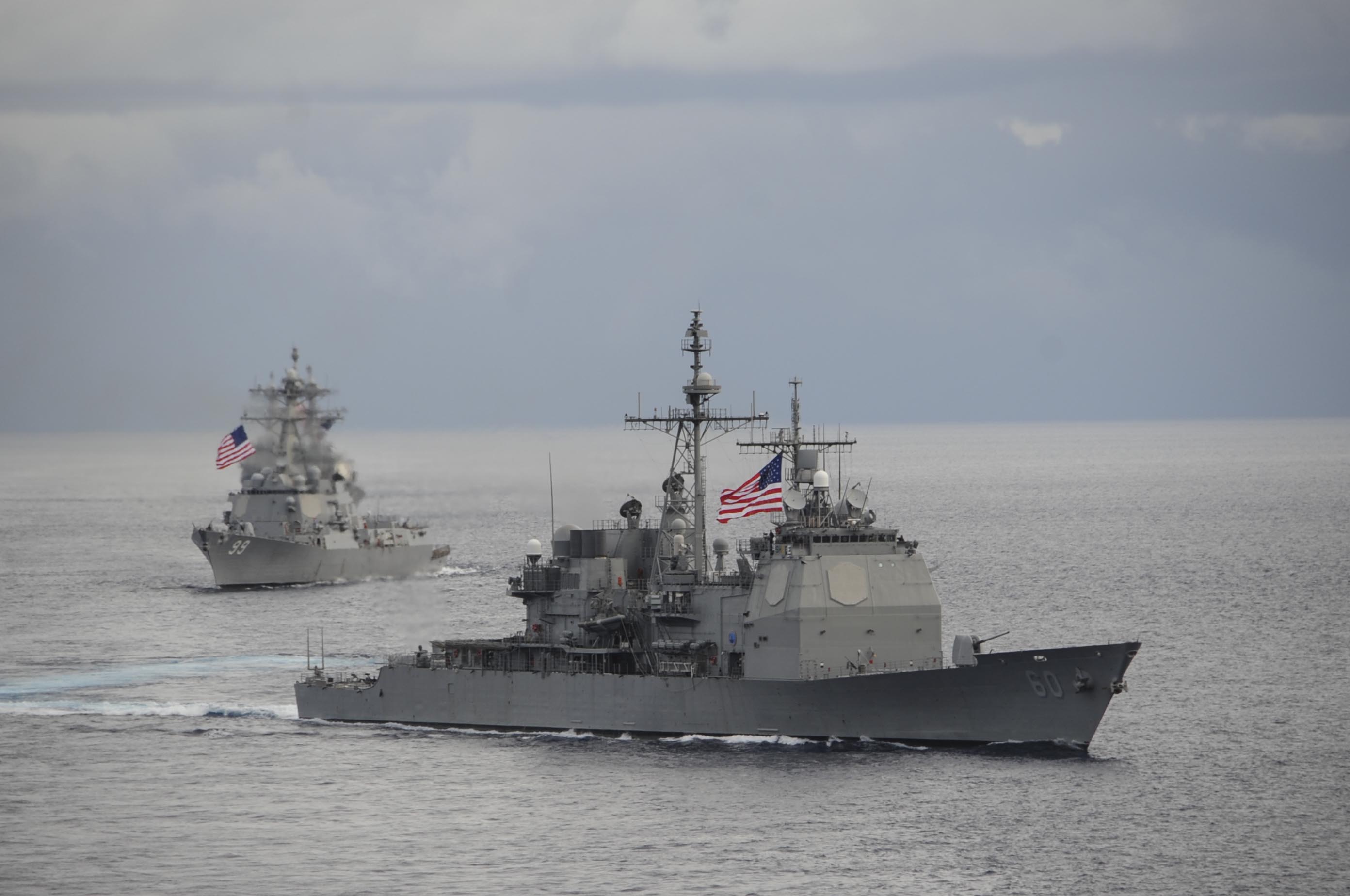 USS Normandy (CG-60) and the guided-missile destroyer USS Farragut (DDG-99) on Sept. 23, 2014. US Navy Photo