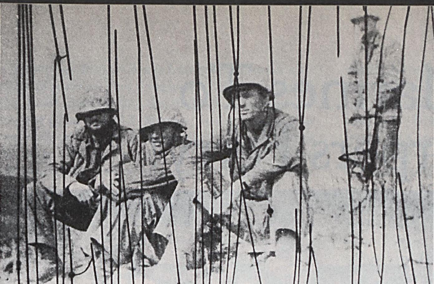 Jack Lummus on Iwo Jima shortly before he was killed. Enemy shelling damaged the film. Photo Courtesy W.E. Wallace 