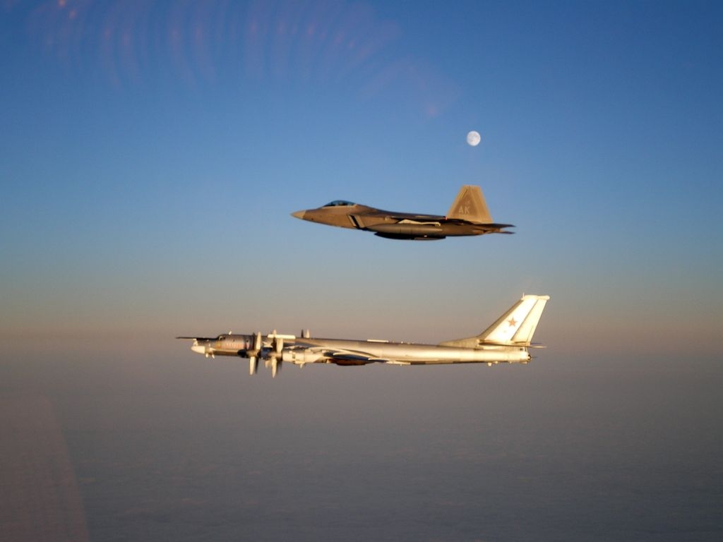 US Air Force F-22 Raptor escorting a Russian Tupolev Tu-95 Bear bomber in 2011. US Air Force Photo