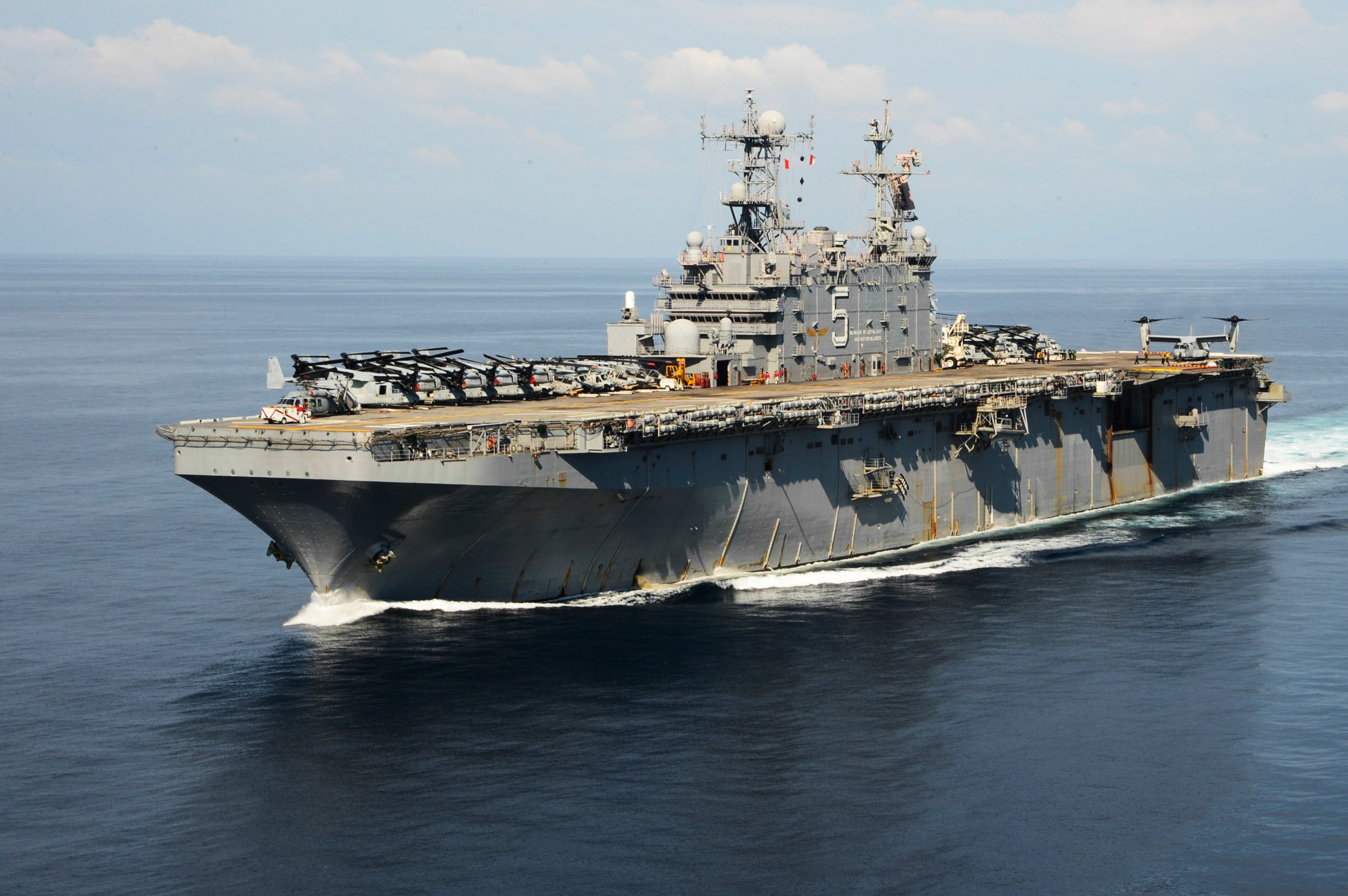 USS Peleliu (LHA 5) is underway in the Philippine Sea in its last 2014 deployment. US Navy Photo