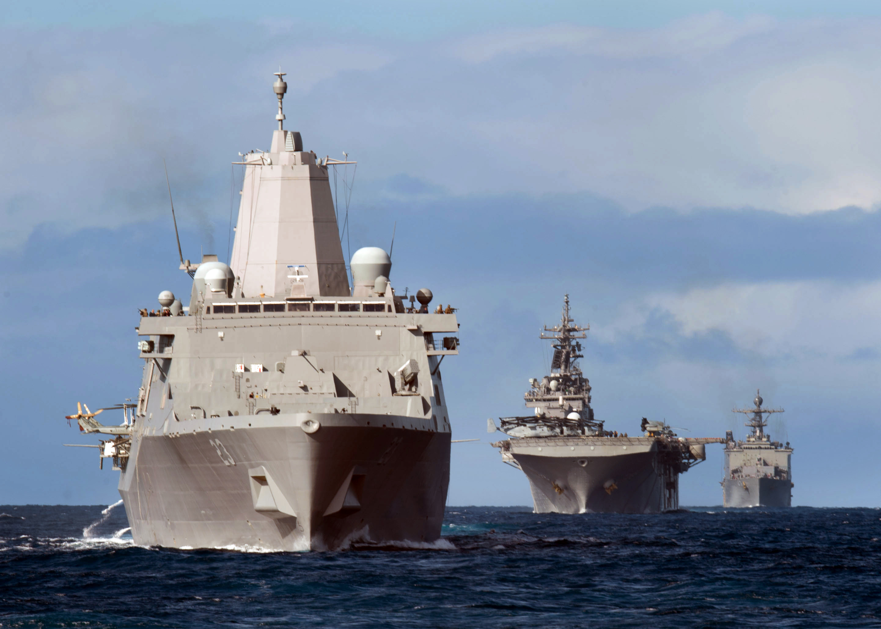 Essex ARG consists of the Wasp-class amphibious assault ship USS Essex (LHD-2), the San Antonio-class transport dock ship USS Anchorage (LPD-23), and the Whidbey Island-class amphibious landing dock ship USS Rushmore (LSD-47) on Feb. 28, 2015. US Navy Photo 