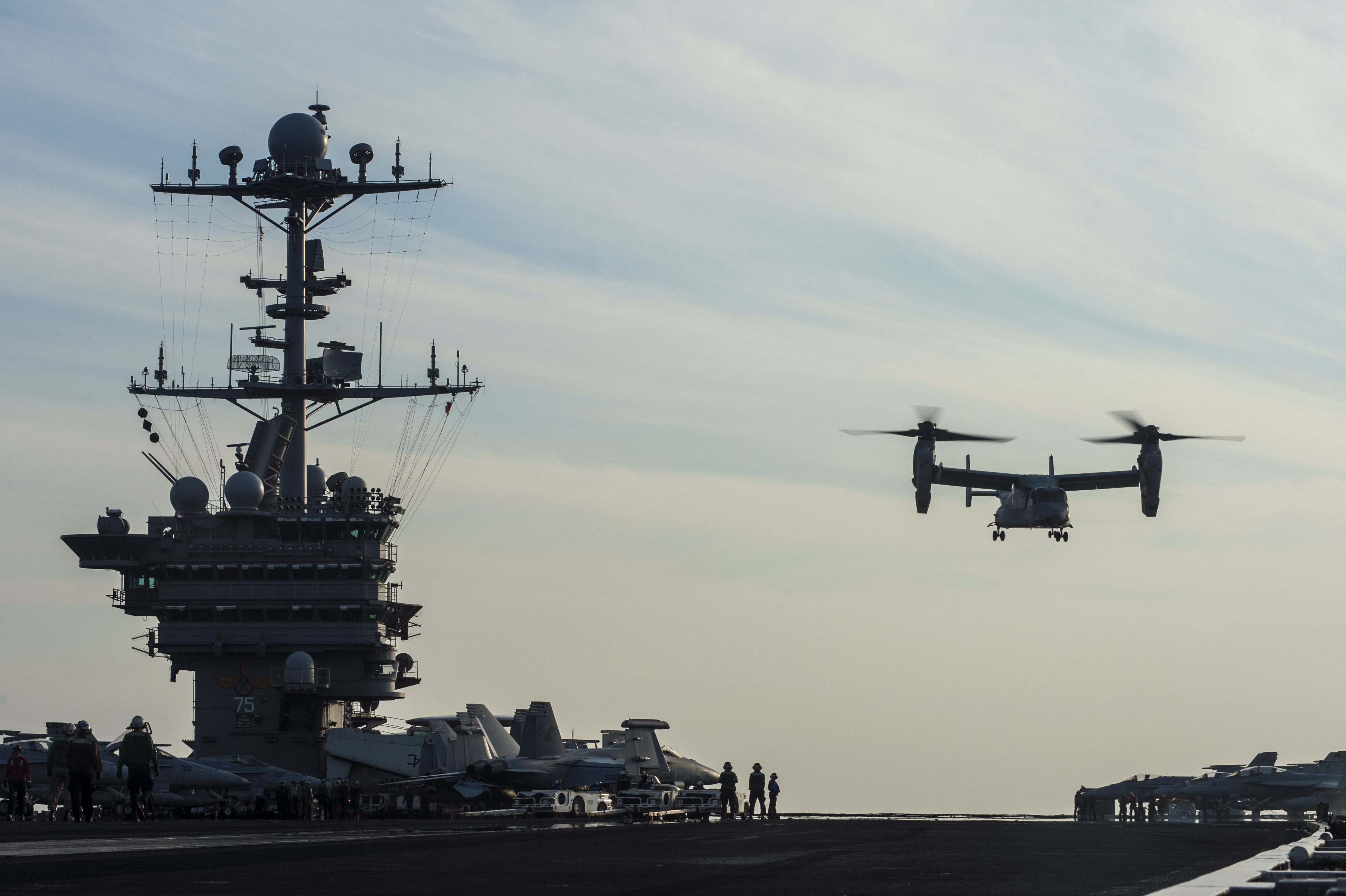 An MV-22 Osprey, assigned to Marine Medium Tiltrotor Squadron 166, launches from the flight deck of the aircraft carrier USS Harry S. Truman (CVN-75). US Navy Photo